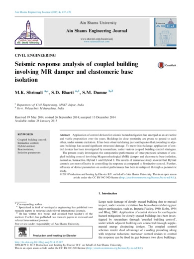 Seismic response analysis of coupled building involving MR damper and elastomeric base isolation